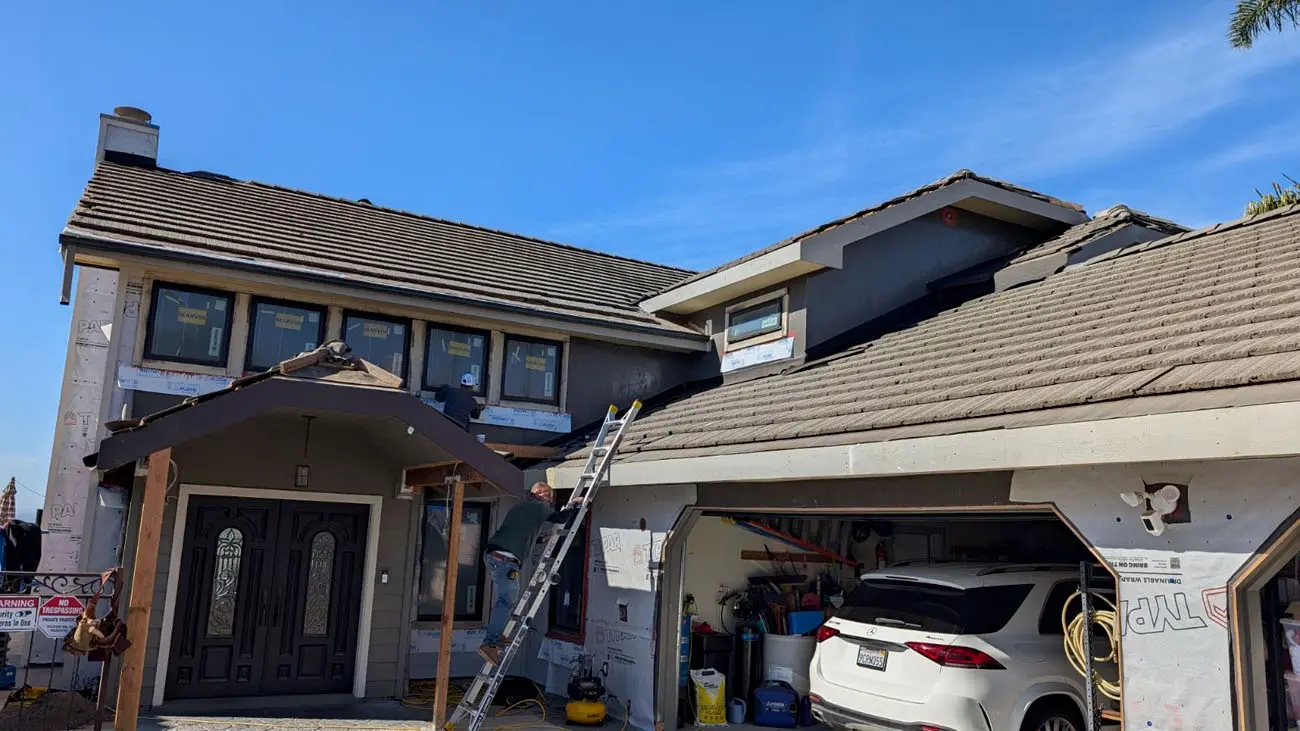 Home exterior masked and prepped before painting by Piñon Painting in Arroyo Grande, CA